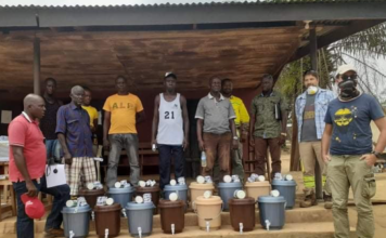 MNG Gold Donates Buckets, Chloride to affected communities in Bong in Fight Against COVID-19