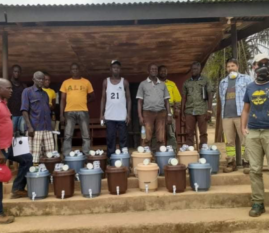 MNG Gold Donates Buckets, Chloride to affected communities in Bong in Fight Against COVID-19