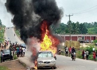 EPS Officer Stabs Car Washer To Death In Kakata-Angry Crowd Sets Vehicle Ablaze