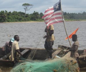 Kru cannoes at a fishing point in Marshall