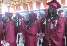 Central Bank official urges Tubman High School graduates to seek higher education Tubman High student