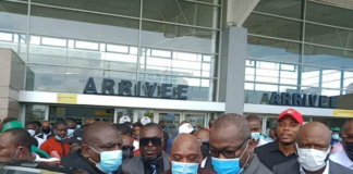 Ex-Ivorian officials return home after decade in exile