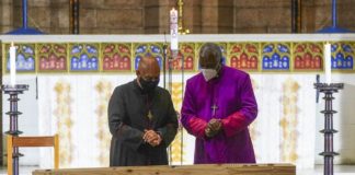 Desmond Tutu’s body lies in state in his old cathedral ahead of burial on New year day