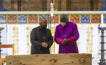 Desmond Tutu’s body lies in state in his old cathedral ahead of burial on New year day