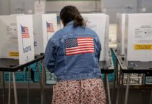U.S. Mid-term Voting went uneventful despite fears of intimidation and conspiracies Americans vote