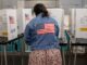 U.S. Mid-term Voting went uneventful despite fears of intimidation and conspiracies Americans vote