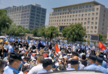 iPhone maker apologises after huge protests at China plant Protest at iPhone factory