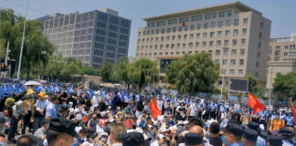 iPhone maker apologises after huge protests at China plant Protest at iPhone factory