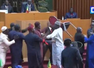 Senegalese parliamentarians exchange punches, insults and throw chairs in session Senegalese Lawmakers