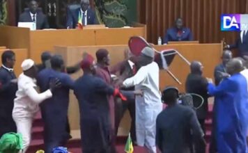 Senegalese parliamentarians exchange punches, insults and throw chairs in session Senegalese Lawmakers