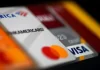 Americans are piling up credit card debt — and it could prove very costly photo of creditcard