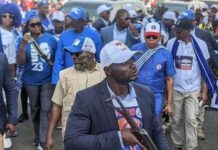 Government confirms Executive Protection Services’ officers wearing of ruling party regalia EPS Officer with CDC t- Shirt