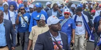 Government confirms Executive Protection Services’ officers wearing of ruling party regalia EPS Officer with CDC t- Shirt