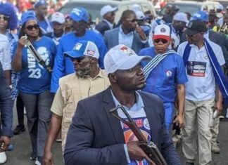 Government confirms Executive Protection Services’ officers wearing of ruling party regalia EPS Officer with CDC t- Shirt