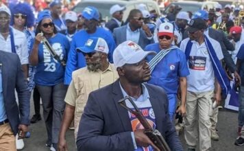 Government confirms Executive Protection Services’ officers wearing of ruling party regalia EPS Officer with CDC t- Shirt