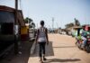New study shows Fewer than 5,000 steps a day enough to boost healthy life Lady walking in Liberia