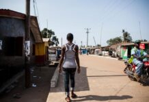 New study shows Fewer than 5,000 steps a day enough to boost healthy life Lady walking in Liberia