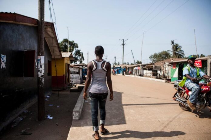 Lady walking in Liberia