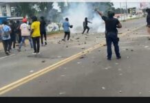 Tension Erupts Between Police and CDC Partisans During suspected Drug Raid Near Party Headquarters