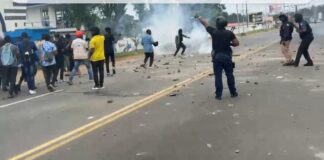 Tension Erupts Between Police and CDC Partisans During suspected  Drug Raid Near Party Headquarters