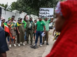 Nigeria warns its citizens in South Africa to be cautious after march turns violent