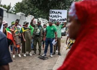 Nigeria warns its citizens in South Africa to be cautious after march turns violent