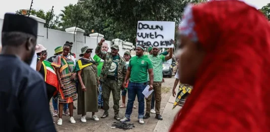 Nigeria warns its citizens in South Africa to be cautious after march turns violent